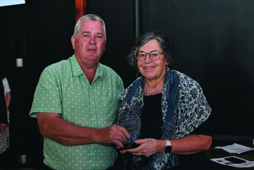 LSA Board member Kevin Cantley presents the LSA Award to Chris Materne. LSA Board member Talia Begley presents the LSA Award to Chris Materne.